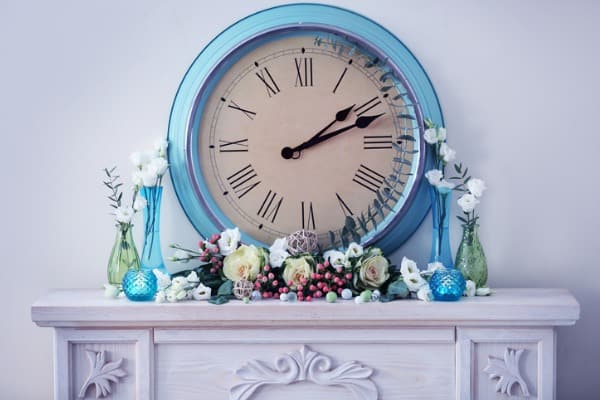 large clock over fireplace