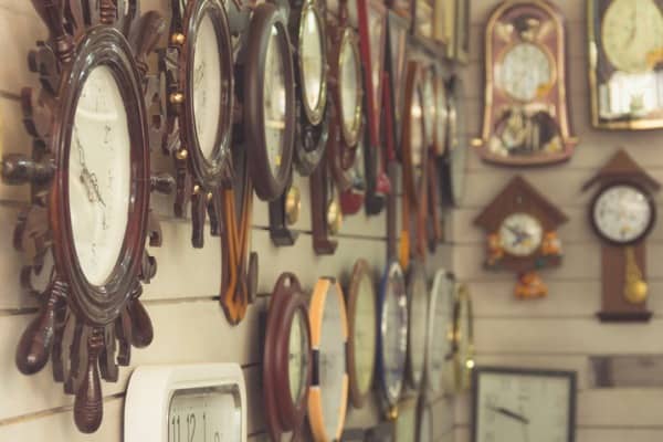 lots of large clocks on wall