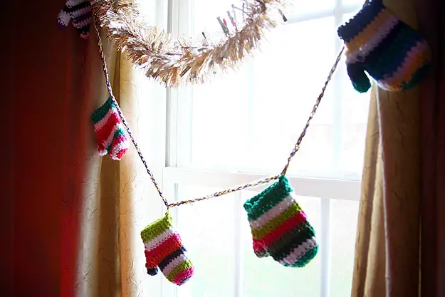 garland of mitten around the window